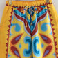 Patterned yellow satin pants