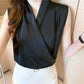 Sleeveless black satin blouse