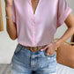 Pink satin blouse with short sleeves