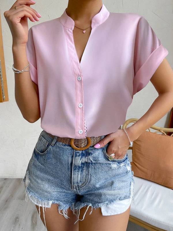 Pink satin blouse with short sleeves